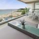 Luxury 3-bed apartment, with direct beach access, free parking & sea views !