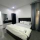 Homely Lodge & Apartments, Badore (foto 8)