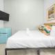 Room 2: Stylish Escape by Calle Cerra Art, San Juan