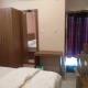 Happy Holiday Inn, 加姆布 - 照片 8