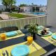Apartment with a pool near the beach