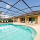 #350-Stunning Villa with Modern Decor, West Facing Pool Overlooking Private Conservation Land Davenport - Fotografie 1