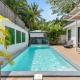 Stylish Modern Home with a Tranquil Outdoor Oasis, Spacious Open Floor Plan, and Private Swimming Pool