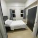 AMA Tower Residences - Liam Kyro Staycation Place, Manila - Fotografie 3