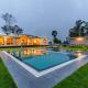 Stayvista at Serenova with big pvt pool and lawn - Your Luxury escape awaits !