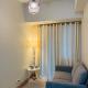 One Bedroom Family Suite with Balcony MOA Shore 3, Manila - Fotografie 1