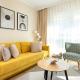 Sunny Apartment with Parking near Polsat Plus Arena by Noclegi Renters