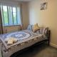 Double bedroom in a residential home with parking Wootton - Fotografie 1
