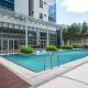 Uptown Parksuites BGC Stylish 2BR Fast WiFi Washer Balcony, Manila - Fotografie 2