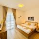 Sleek Stays - 1BR with balcony at Yas Island near Sea World,Etihad Arena Abú Zabí - Fotografie 4