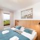 Apartments Cerovic, Malinska (photo 9)
