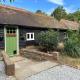 A charming cottage nestled in a peaceful woodland, Byfleet