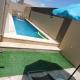 Maison avec piscine, Shanīnī