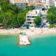 Beachfront Villa Erce with private 40sqm heated pool, a Gym, 7 en-suite bedrooms, a rooftop terrace, 2 living areas, Duće