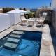 Chariot Apartments Santorini, Kamari - Fotografie 1