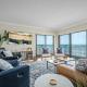 Renovated direct oceanfront corner condo with a huge wrap-around balcony and pool