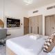 Stylish 1BR Apartment in JVC with Pool, Dubaï - Photo 10