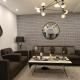 Brick Accent Loft 1BHK with Balcony & Free Netflix, Rawalpindi (zdjęcie 3)