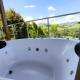 Hidromassagem, Varanda e Vista Pedra do baú Gonçalves - Fotografie 2
