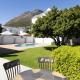 Four Peaks Duplex - 4 Sleeper with Mountain Views, Balcony and Pool in Hout Bay Beachfront - Fotografie 7