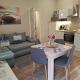 FAND Center Apartman, Segedyn