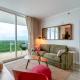 Elegant 2BR Condo at Hotel Arya Full Kitchen Wraparound Views 2 Parking Spots