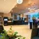 RJE Staycation Suites Mall of Asia near Airports, Manila - Fotografie 10