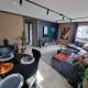 Spacious and central apartment with a private garden, Free parking and Free EV recharging