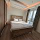 ROYAL TWO BED SUITE APARTMENT - GOLDCREST MALL AND RESIDENCY By ALVIS SUITE, Lahore (foto 9)