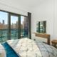 Luxury 2BR near Burj Khalifa with Rooftop Pool, City & Canal Views, Free Parking, Dubaï - Photo 10