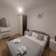 Apartment Dominik - Two Bedroom Apartment with Terrace and Sea View, Smokvica (fotografie 9)