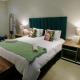 The Executive - Exclusive Self-Catering Apartments - Ezulwini - Fotografie 7