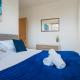 Spacious Two-Bedroom Apartment - Parking, 7 Mins from Station, Ideal for Business or leisure Stays By AV Hughes Properties, Милтон-Кинс (фото 2)