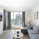 Modern 1BR Condo, Sleeps 4 with Views, AC, Balcony, Near SkyTrain, Burnaby