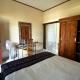 Regina Guest House Ubud - Photo 4
