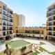 Beachside 1BR Apt Pool, Balcony & Free Parking Ras al Khaimah - Photo 1