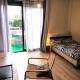 COLOMBUS Grand studio, Coin nuit, Terrasse, Wifi, TV, Tours (Foto 4)