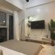 Playful 1BR With Magnificant Bayview Garden View Near Okada Solaire Aiports with Free Parking, Manila - Photo 1