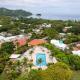 Modern Top-Floor Condo with Panoramic Views and Community Pool, Coco