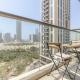 Vogue Stylish and Peaceful Stay in JVC One Bedroom Apartment with Balcony and Garden View with full Amenities Access Dubaj - Fotografie 3