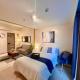 BGC Cozy Condo - Pool, Wi-Fi - Suite 15, Manila - Fotografie 1