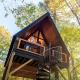Eco-Friendly Solar Powered A-Frame Treehouse with Hot Tub and Private Dock on Littlefield Pond, near Wells, Maine