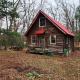 Secluded Luxury Cabin with Hot Tub on 10 Private Acres near Trails in Reed City, Michigan, Idlewild