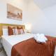 WintowinRentals Renovated loft with garage next to Huelin Beach, Малага - Фото 3
