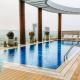 Modern 1BR in JVC Pool, Gym & Free Parking, Dubaj - Fotografie 1
