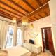 Kalma Via Manno - Central Stay with Stone Walls & Private Cinema