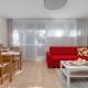 Red Apartment in Wrocław with Two Bedrooms and Desk for Remote Work by Noclegi Renters, Bartoszowice