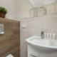 Red Apartment in Wrocław with Two Bedrooms and Desk for Remote Work by Noclegi Renters, Bartoszowice (фото 5)