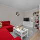 Red Apartment in Wrocław with Two Bedrooms and Desk for Remote Work by Noclegi Renters, Bartoszowice (фото 8)