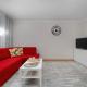 Red Apartment in Wrocław with Two Bedrooms and Desk for Remote Work by Noclegi Renters, Bartoszowice (фото 6)